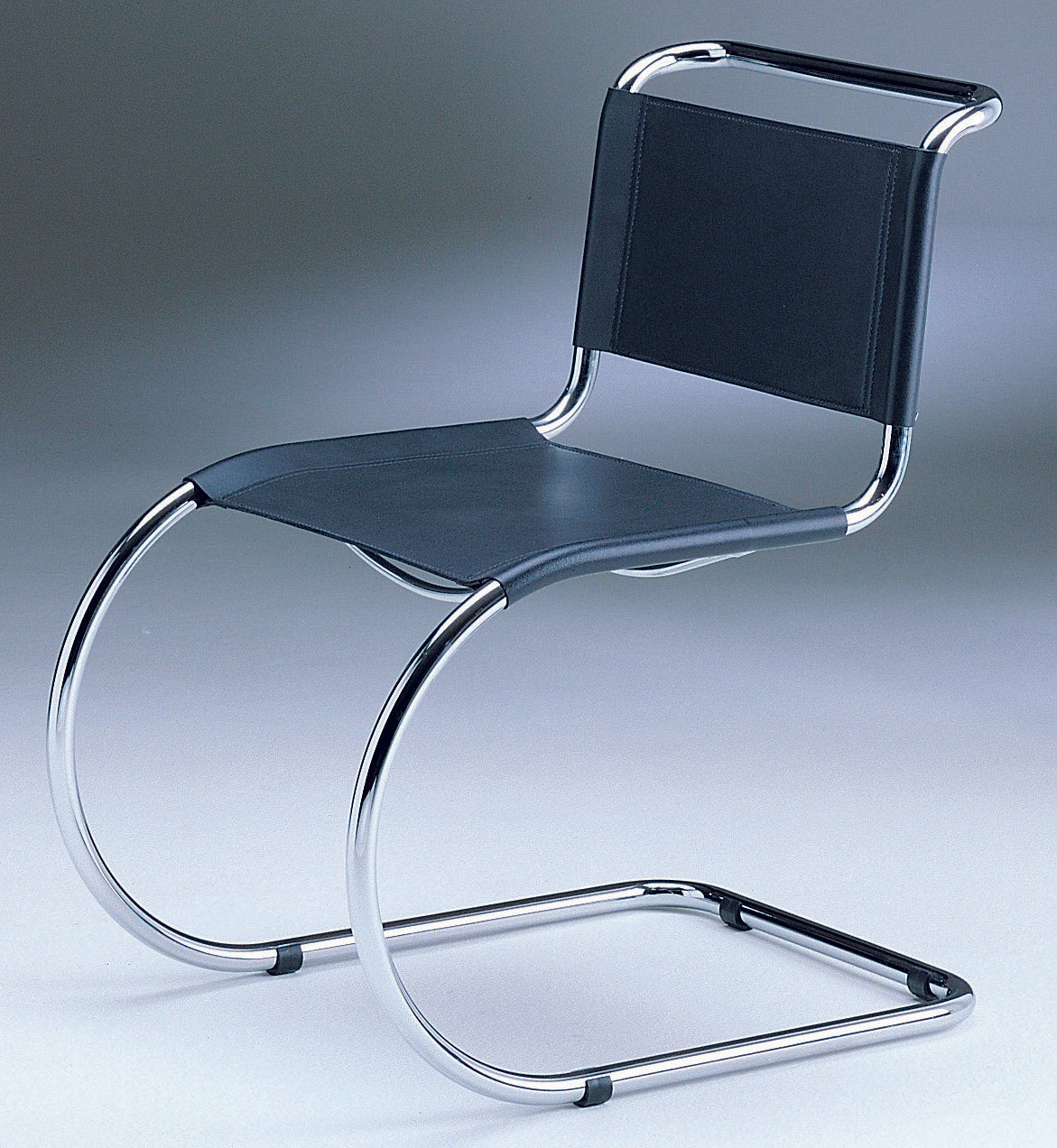 Curved Leather Armchair by Mies Van Der Rohe | Urban Architecture Masterworks Collection